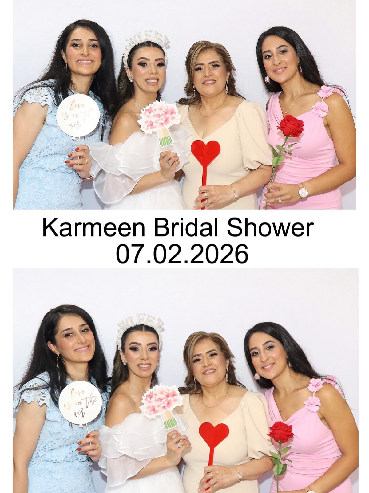 Three friends in novelty sunglasses with heart and ring props at a bridal shower