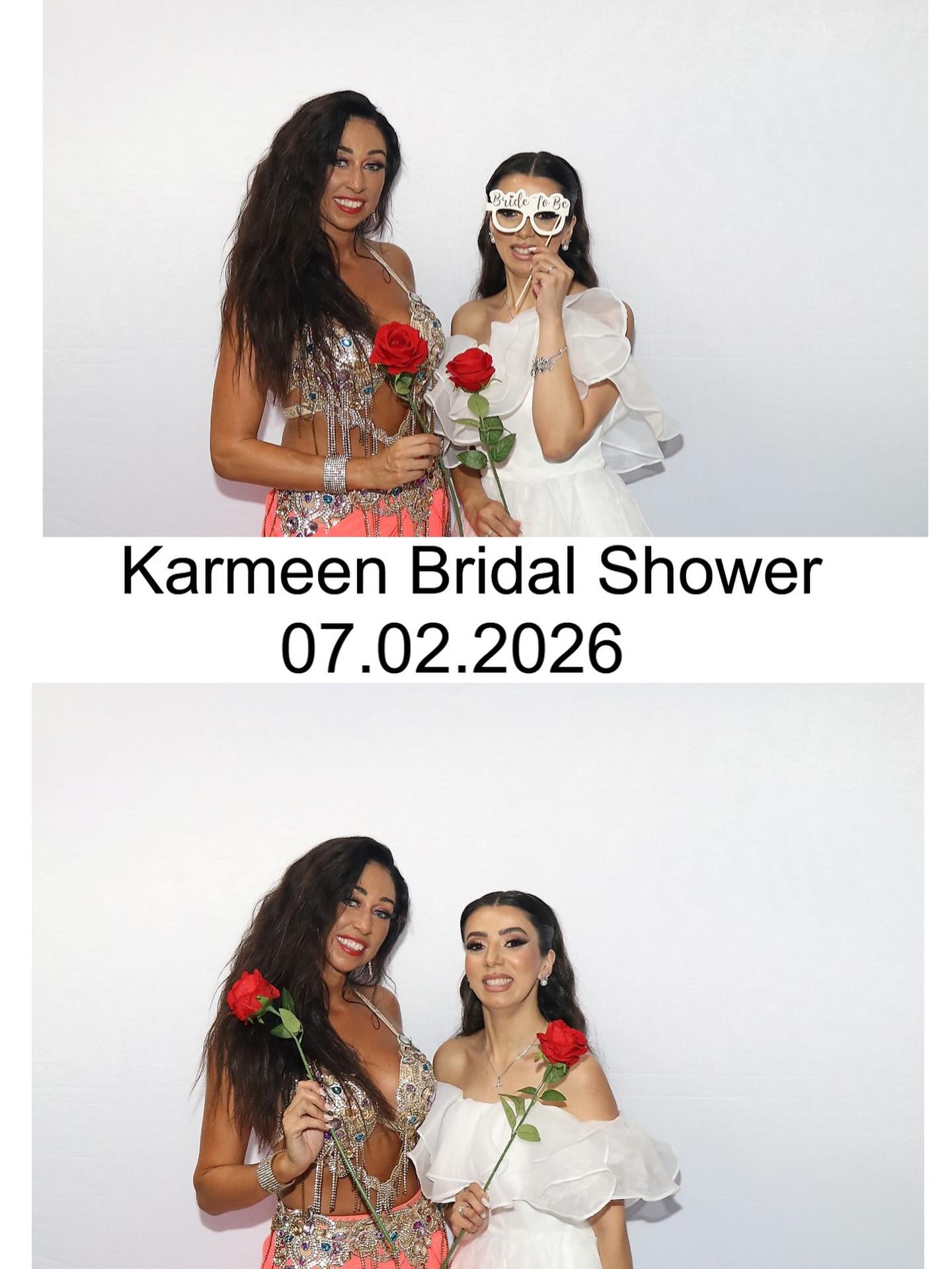 Four friends holding custom signs and a heart prop at a celebration